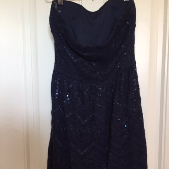 Short sequin dress with flared skirt - Picture 2 of 5
